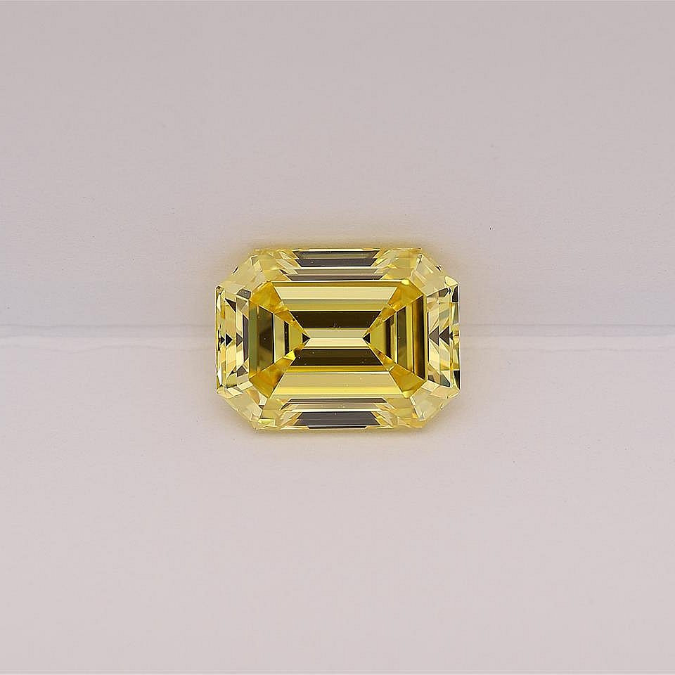 Stunning Fancy Vivid Yellow Emerald Cut Diamond
