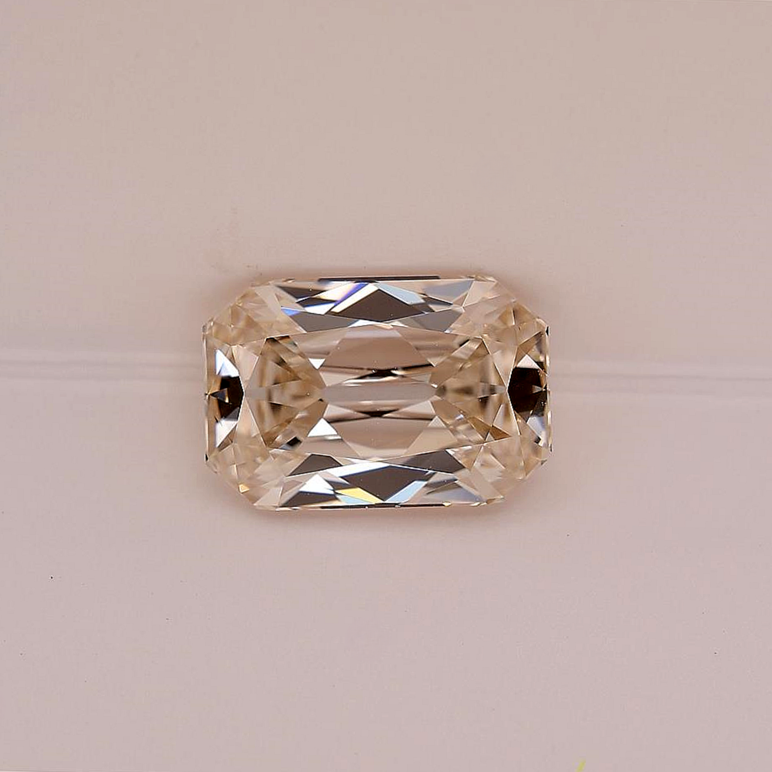 Rectangular cut gemstone on a light gray background