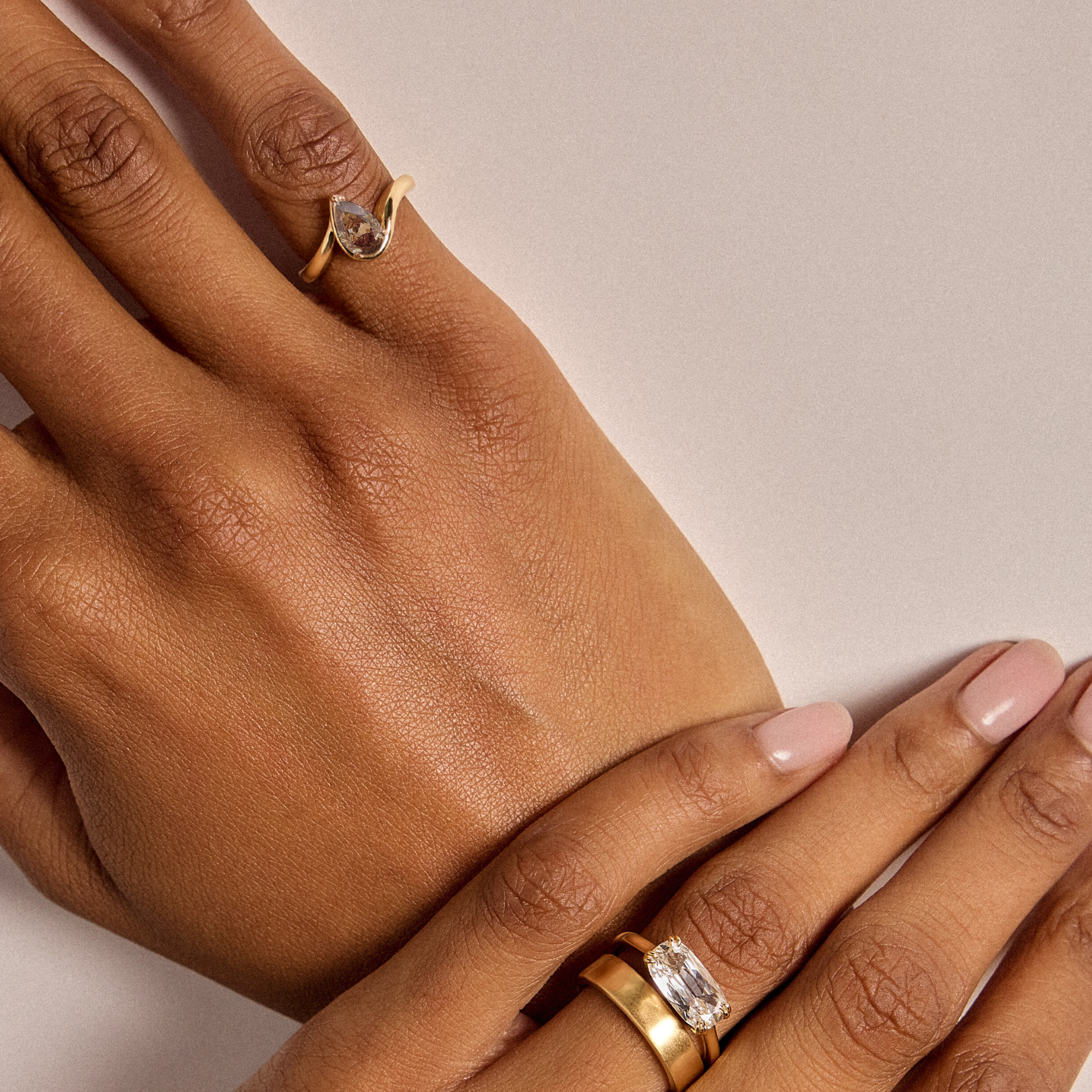 BB Talia Brown Diamond on Right Hand, Left Hand Overlapped with Faena Engagement Ring and Praia Wedding Band