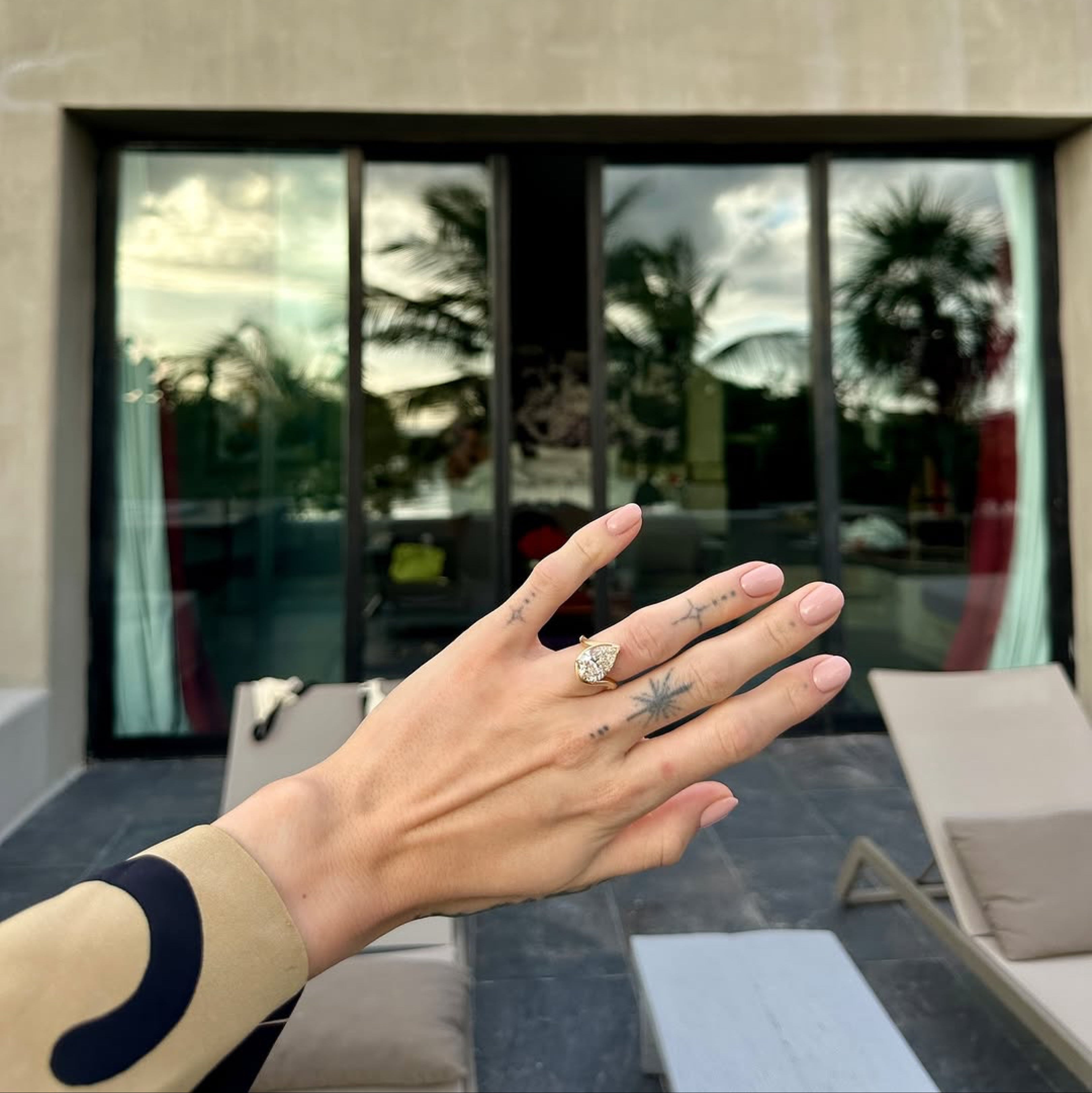 Bespoke TALIA engagement ring with faint brown pear cut diamond, satin finish 18kt yellow gold, on Client