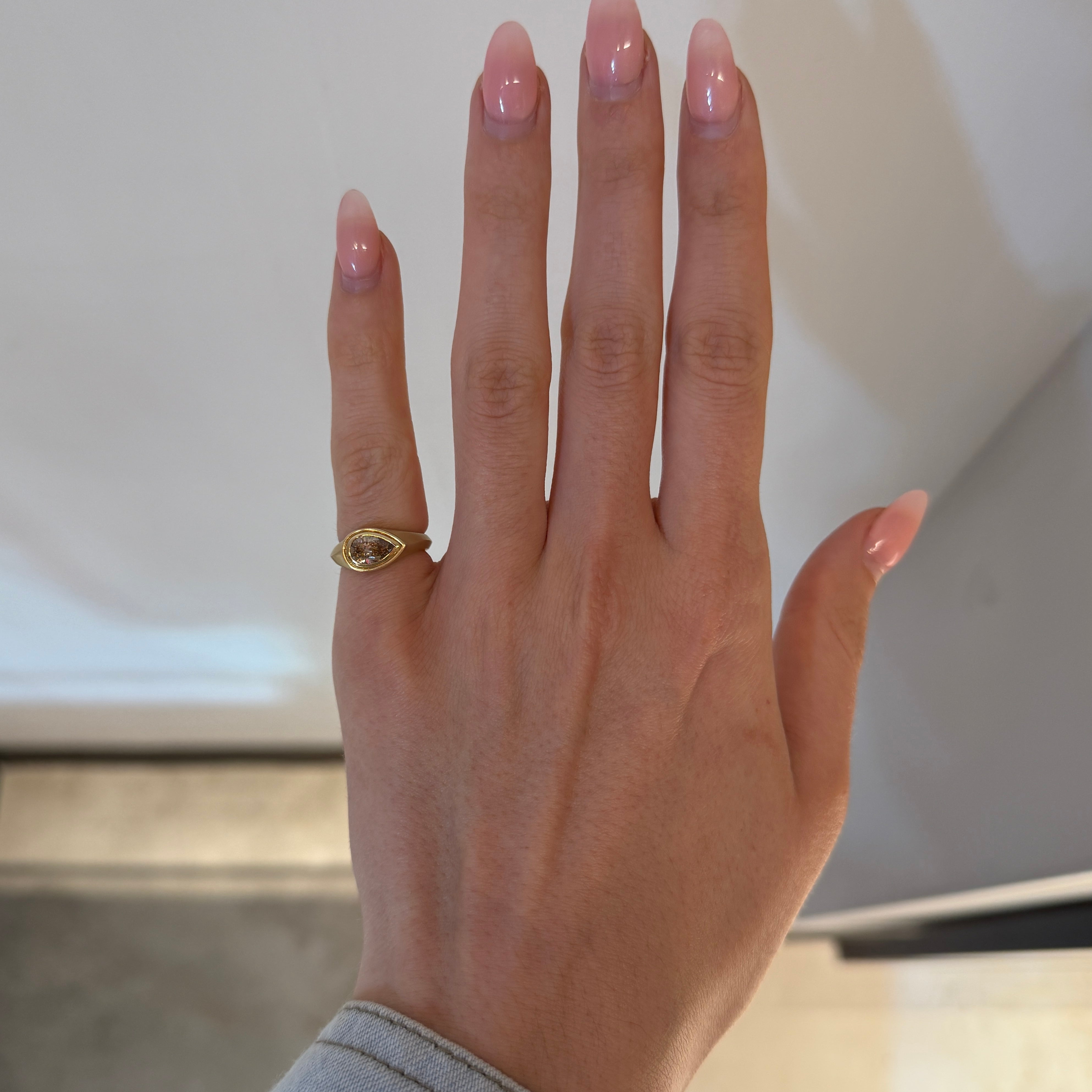brown pear cut diamond pinky ring