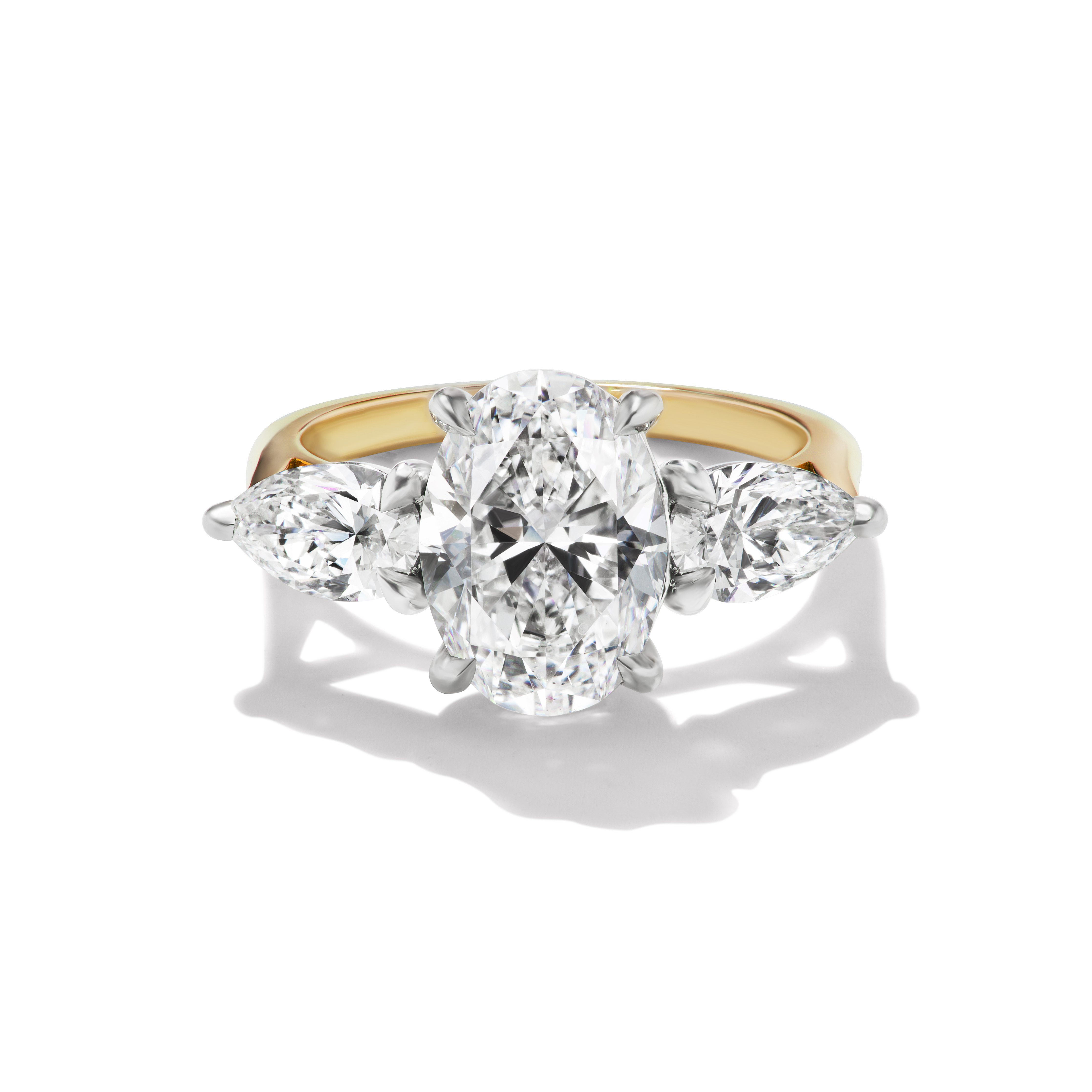 Bespoke Oval and Pear Three Stone Engagement Ring, front view