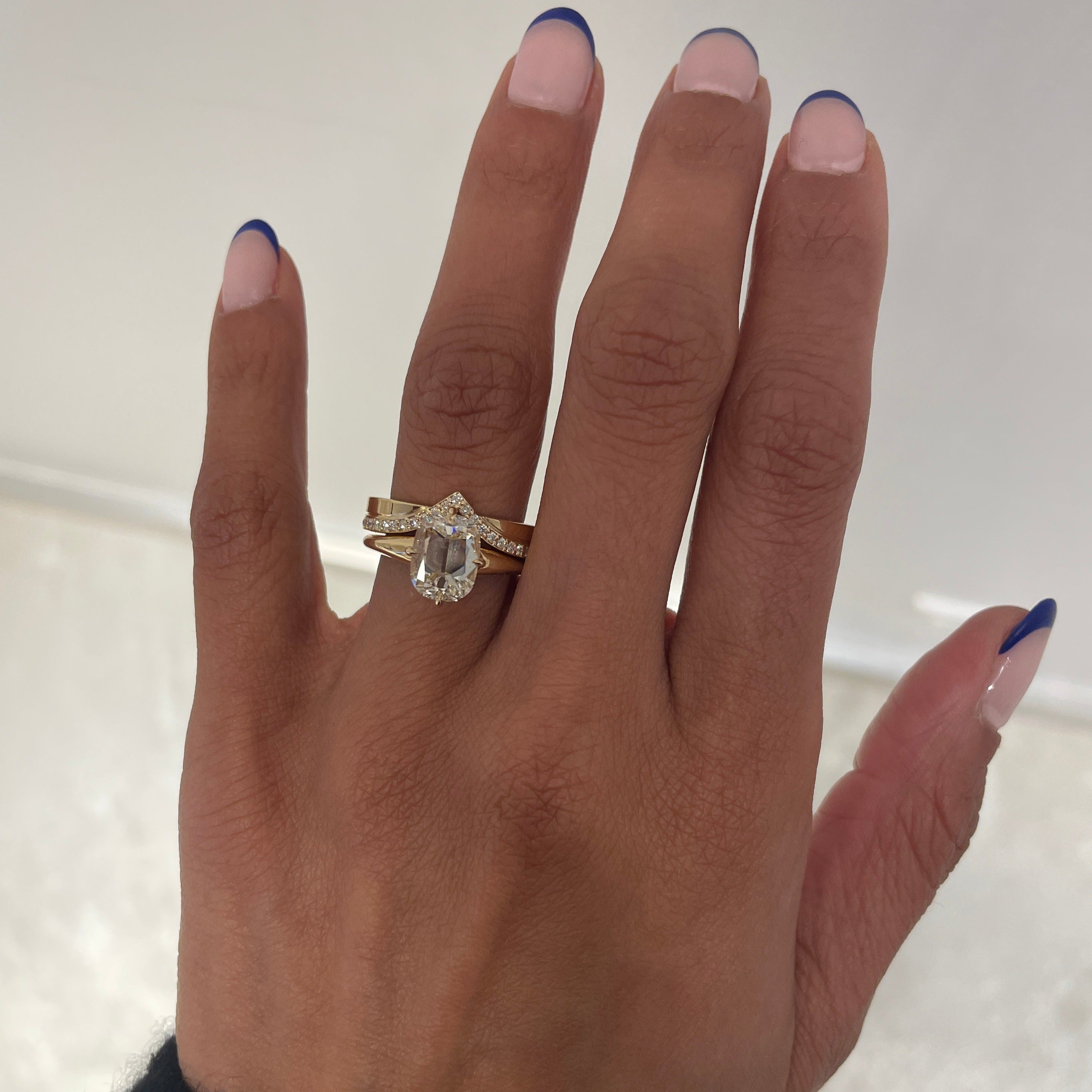 Petite V-shaped Cigar Wedding Band, on hand with MAE Ring
