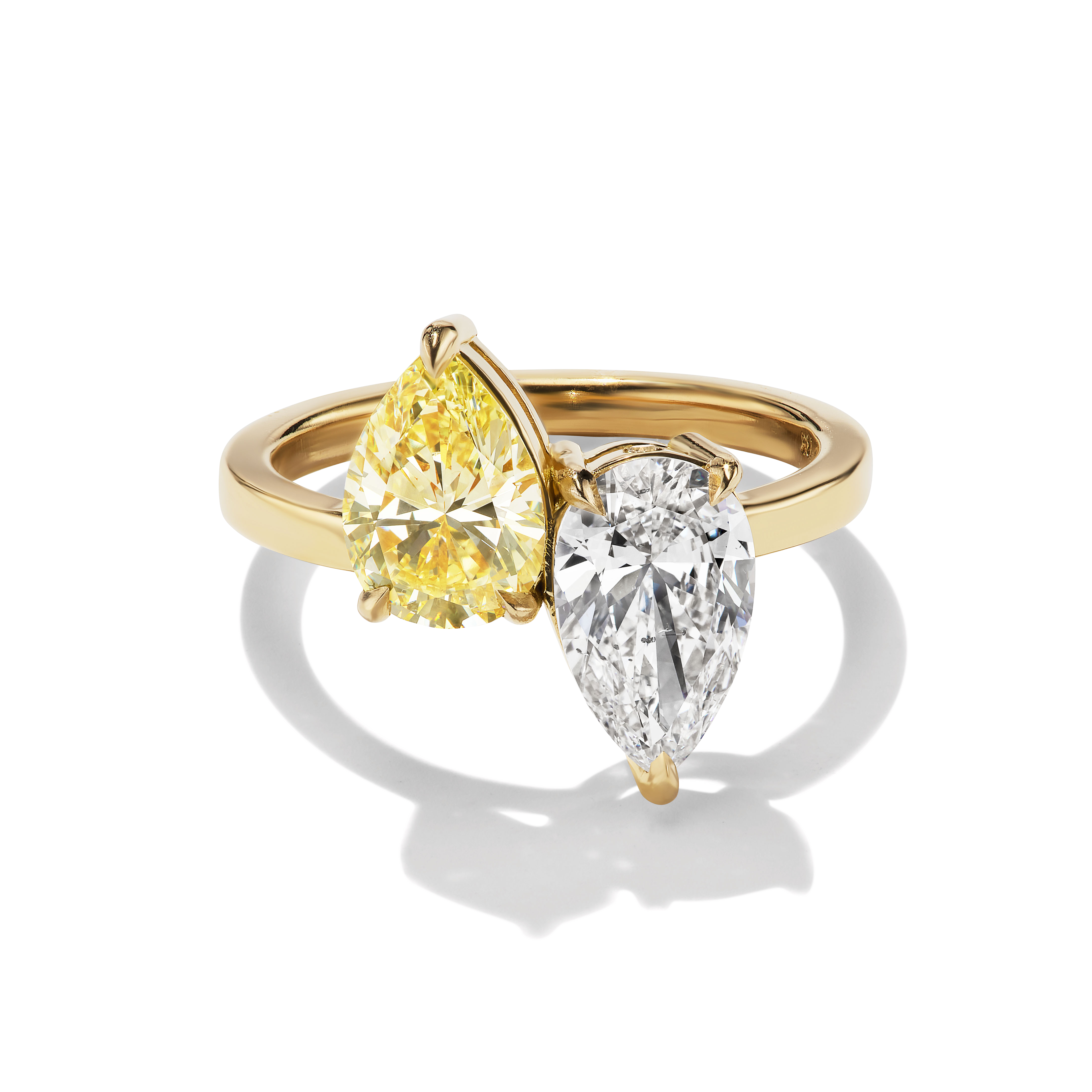 Yellow and White Pear Diamond Toi et Moi, Yellow Pear cut diamond set up right next to white pear cut diamond set downwards, front view
