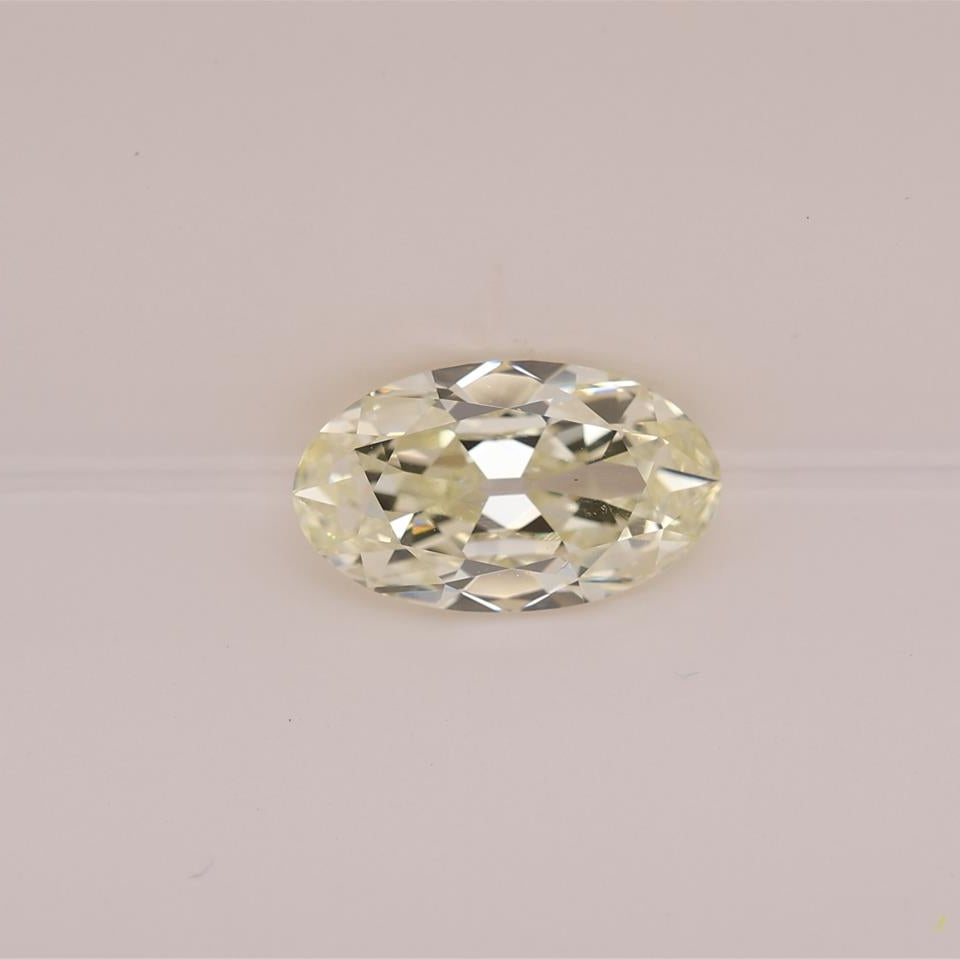 Oval-shaped diamond on a light gray background