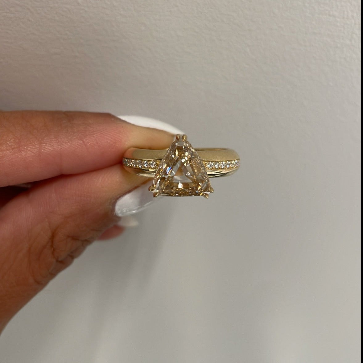 Aziza Engagement Ring Close Up held