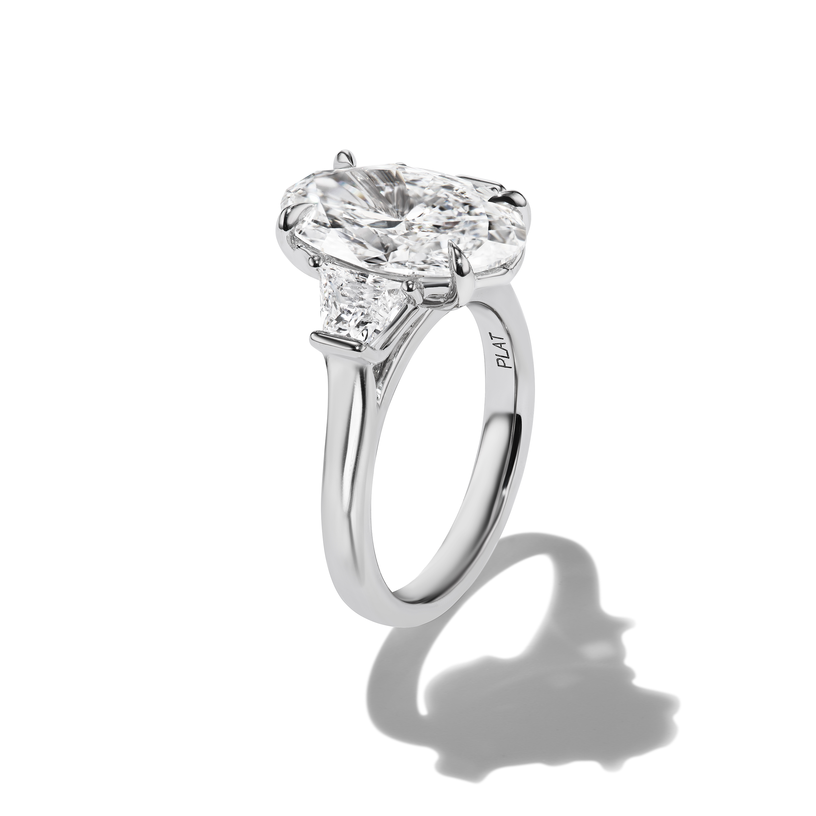 BESPOKE OVAL THREE STONE RING