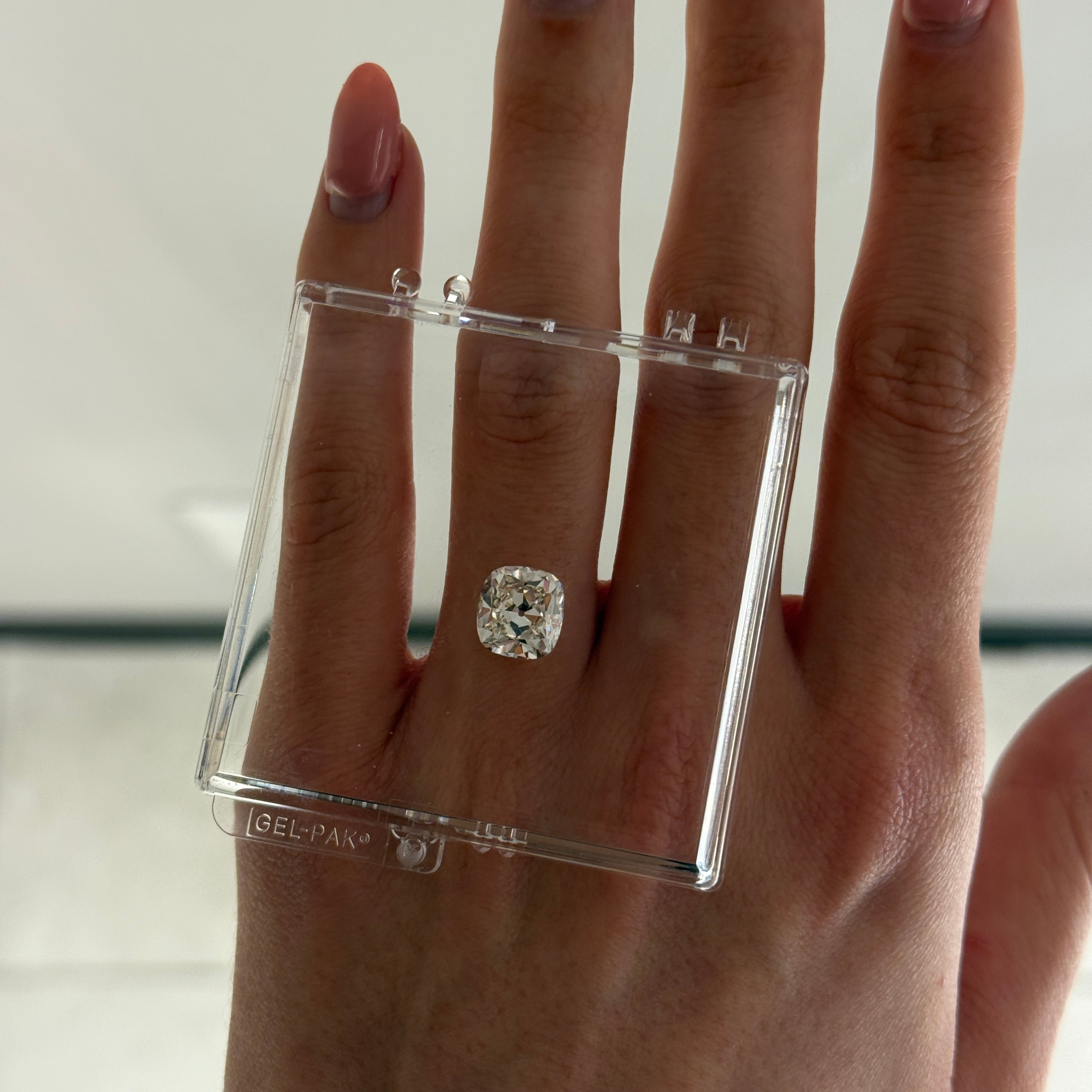 old mine diamond resting on hand