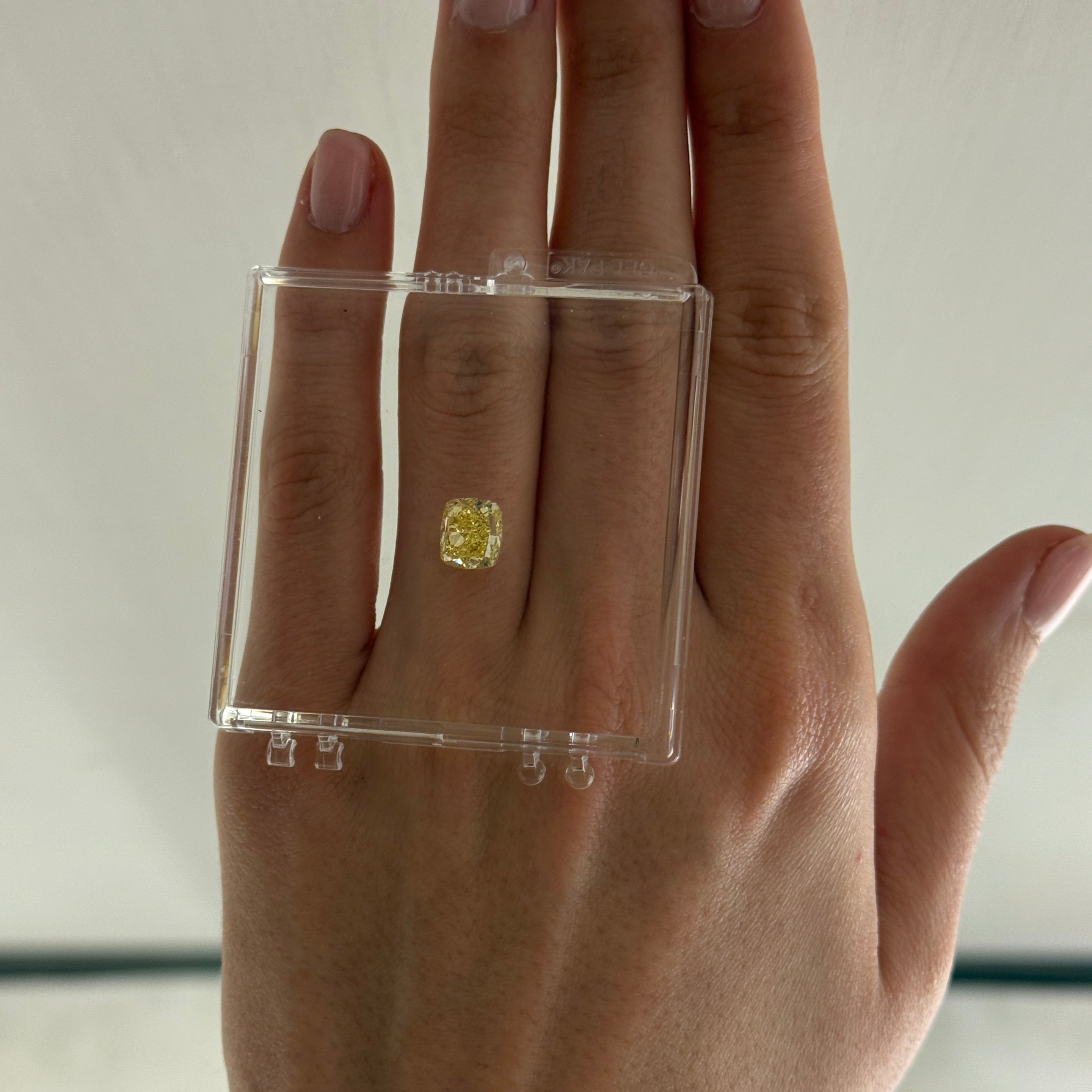 2.74 crt cushion modified brilliant cut diamond on a hand