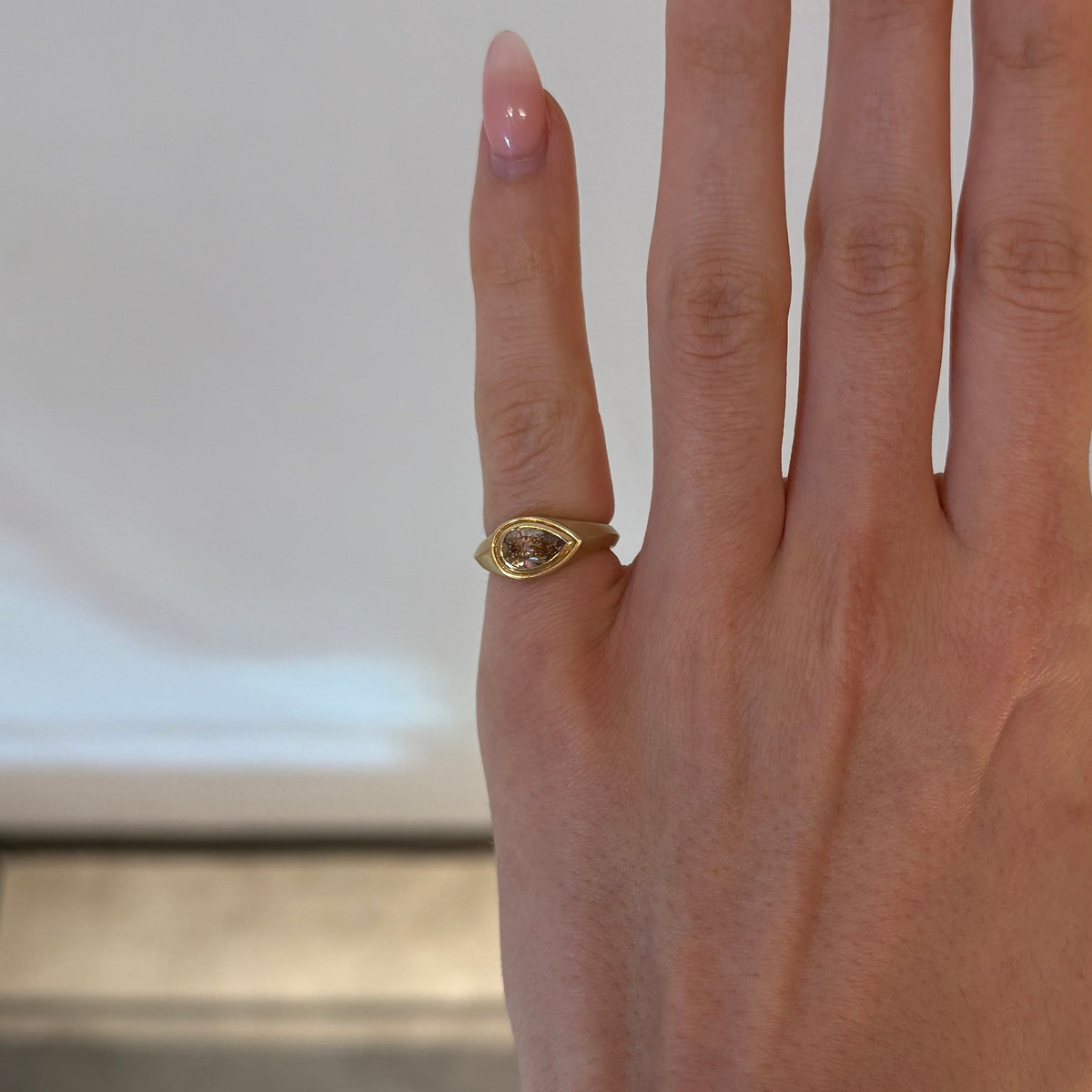 brown pear cut diamond pinky ring