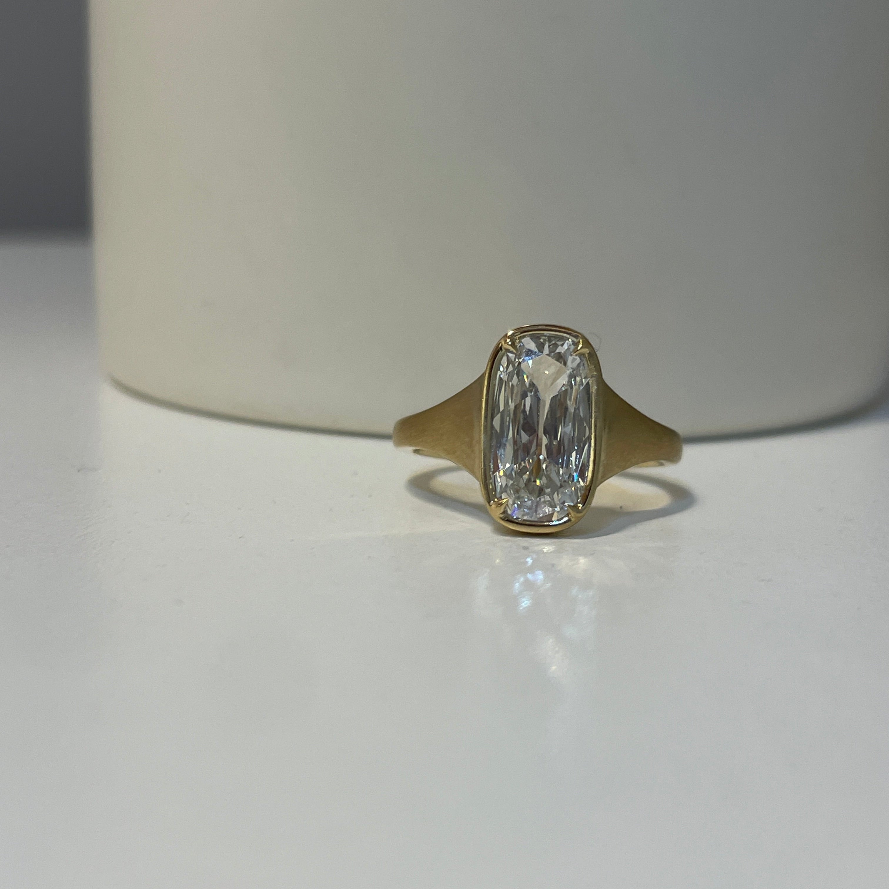 Lucy Ring in Satin Finish on table