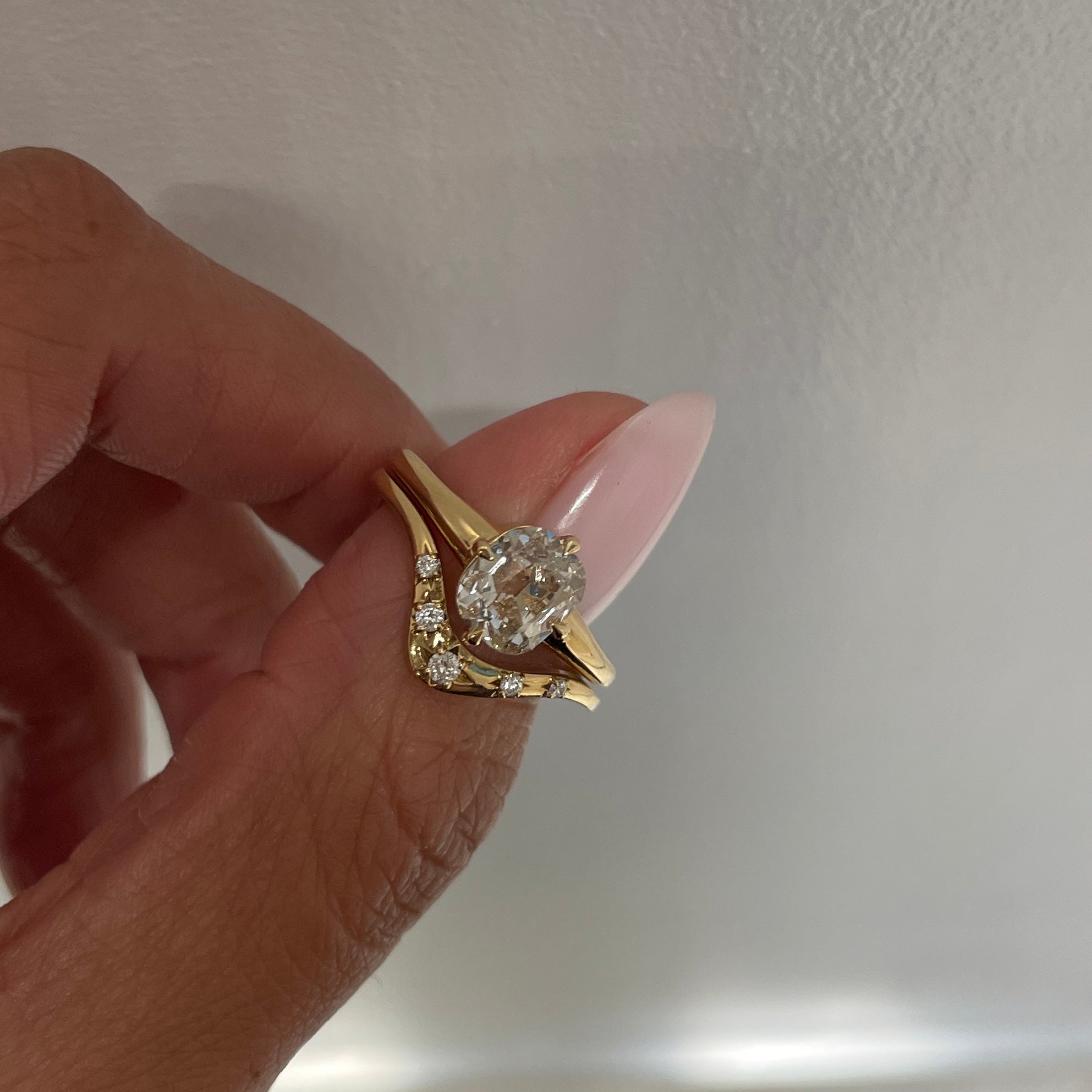 Mae 1.51 engagement ring + Ara wedding band stack on hand