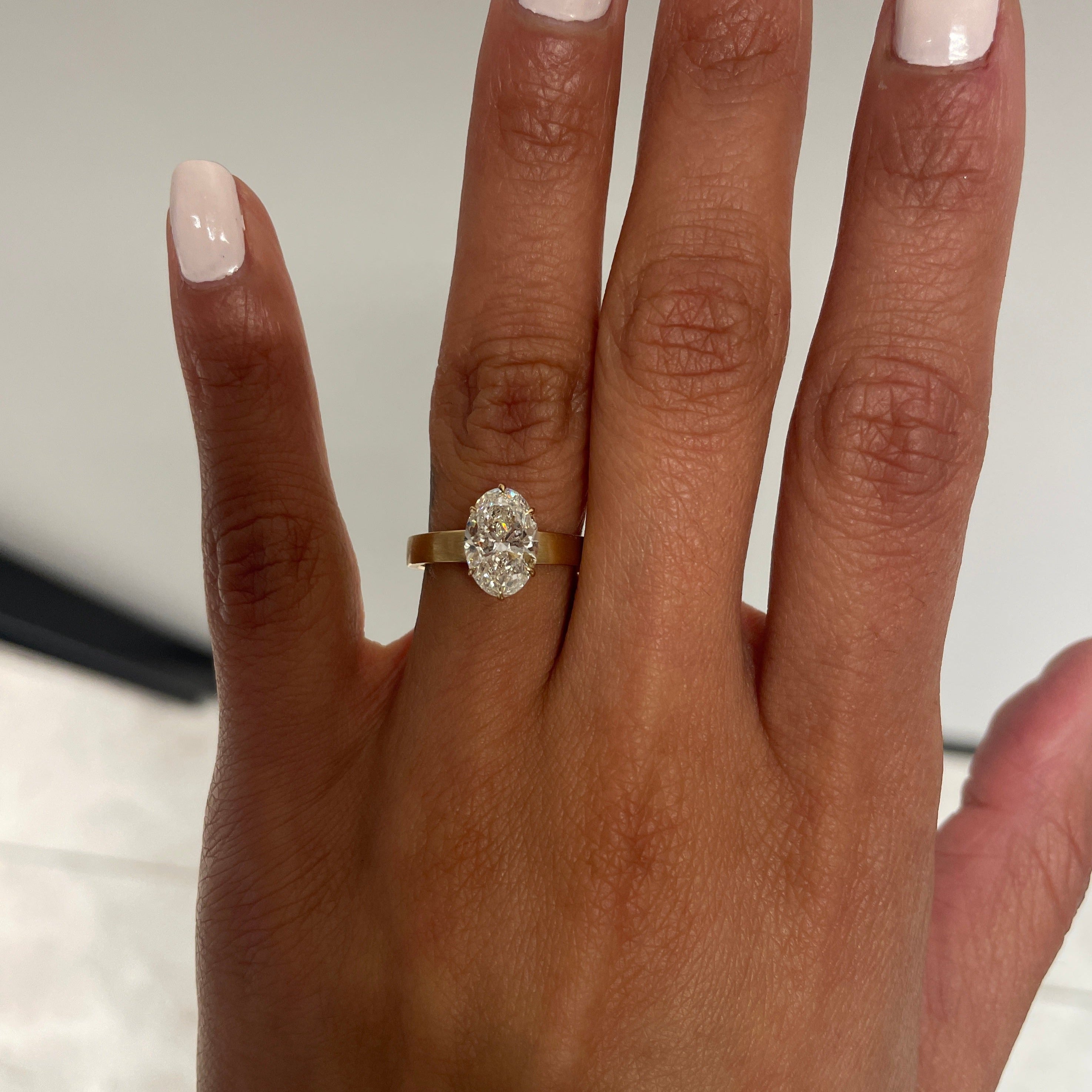 Modified SELENE with Oval Diamond, on finger