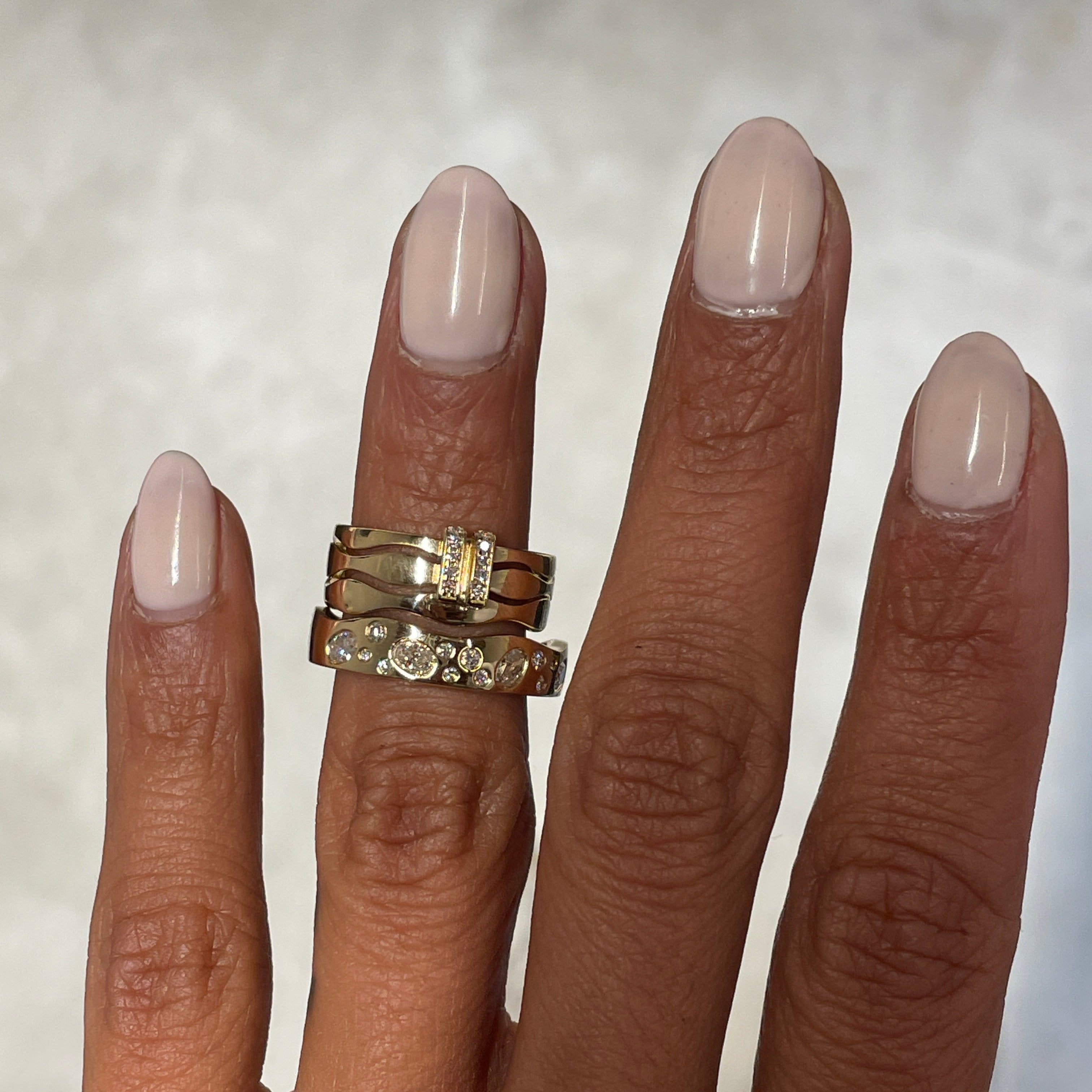 Twin Flames Wedding Band set (His & Hers) on finger