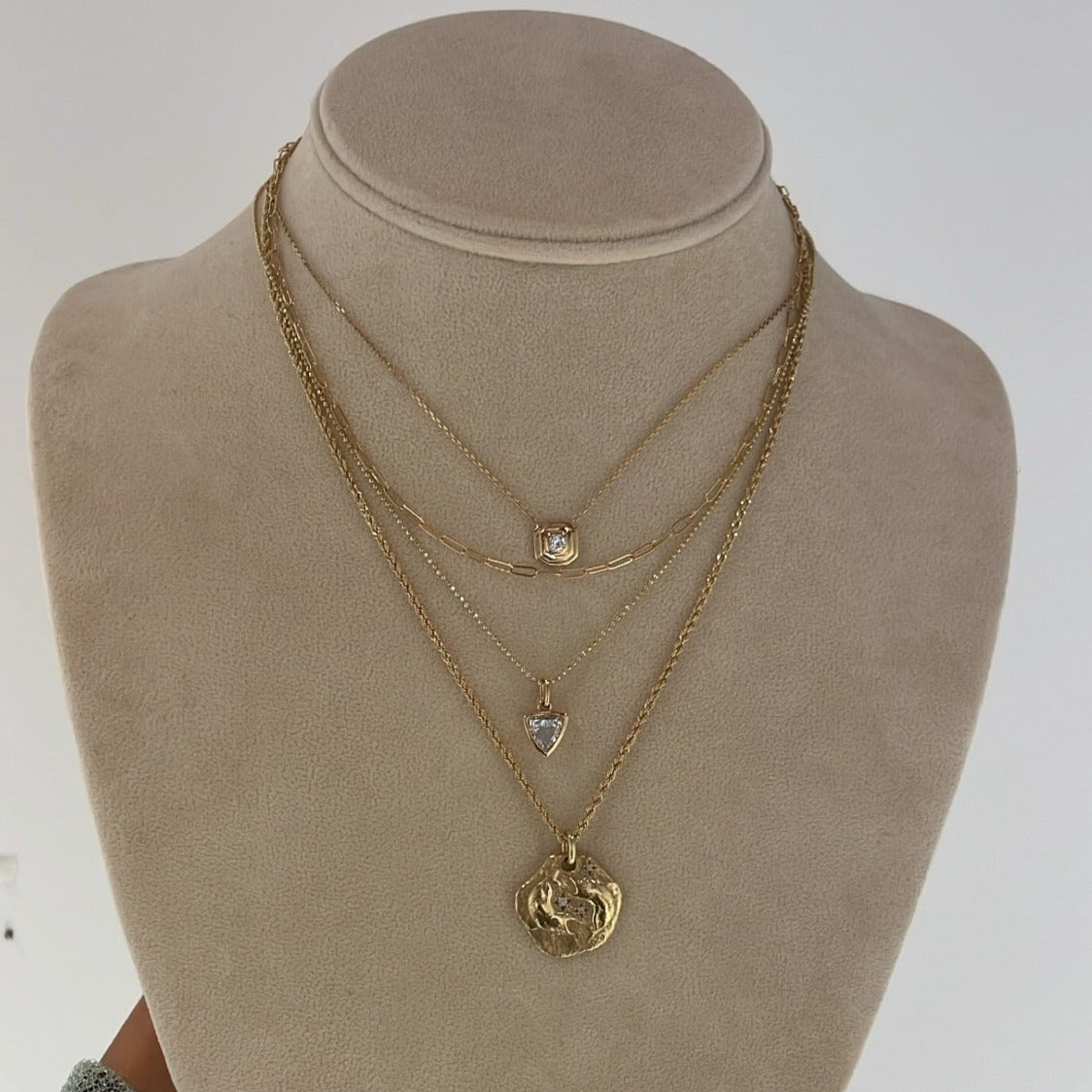 TORI Rosecut Diamond Charm Necklace on stand with other necklaces 